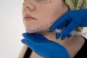 close up hands giving injection young woman